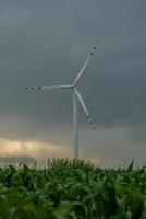 Windmill in stormy weather photo