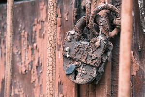 Old and weathered vintage padlock photo