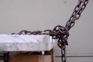 Old rusty and weathered iron chain photo
