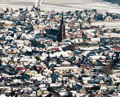 Panoramic drone view of snow-covered vineyards in the Rhine Valley photo