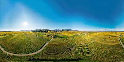 360-degree panoramic view above a multi-colored valley in the Vosges. photo