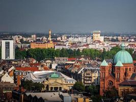 Aerial view of the city of Strasbourg. Sunny day. Red tiled roofs. photo