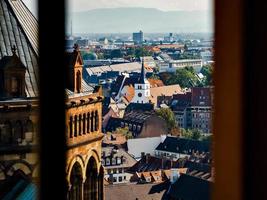 Aerial view of the city of Strasbourg. Sunny day. Red tiled roofs. photo