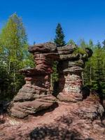 Stone gate, mysterious structure in the Vosges Mountains, France photo