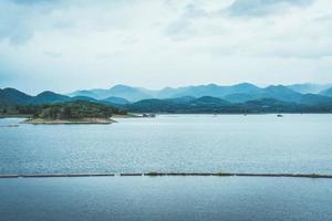 Nature scene of Srinagarind Dam with cloudy sky at Kanchanaburi,Thailand photo