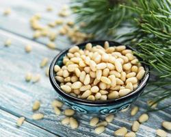 Pine nuts on table photo