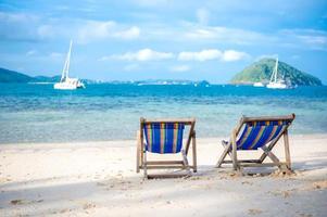 Beach bed on white sand photo