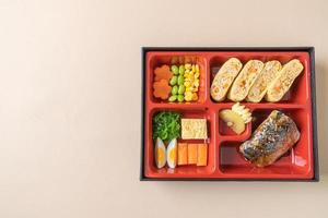 Grilled mackerel saba fish with appetizer in bento set - Japanese food style photo