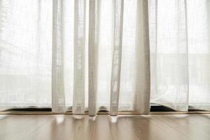 Empty light filtering curtains for background with copy space photo