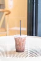 Iced chocolate milkshake in coffee shop cafe photo