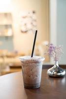 Iced chocolate milkshake in coffee shop cafe photo