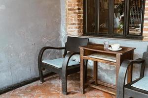 Vintage wood chair and table on balcony photo