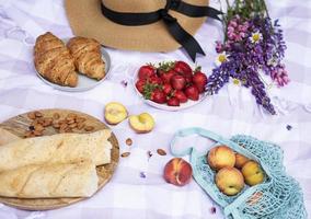 Romantic picnic scene on summer day photo