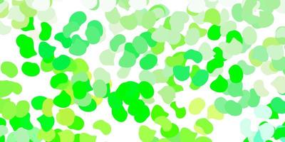 Light green, yellow vector pattern with abstract shapes.