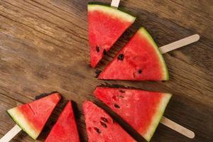 Fresh watermelon on a wooden background, Food top view photo