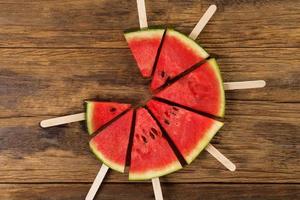 Fresh watermelon on a wooden background, Food top view photo
