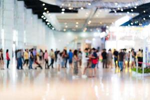 Blur image background of people in exhibition show photo