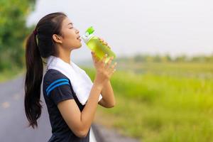 Portrait of beautiful girl in sportswear in the outdoors photo