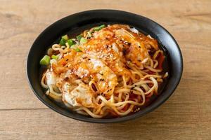 Ramen noodles with gyoza or pork dumplings - Asian food style photo