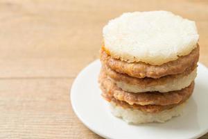 Homemade grilled pork with sticky rice burger photo