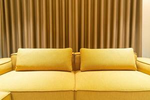 Empty golden mustard sofa in living room photo