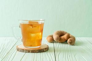 Delicious sweet drink tamarind juice and ice cube photo