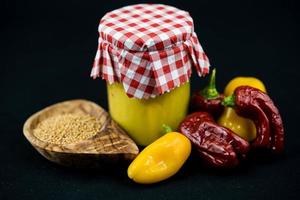 homemade extra hot mustard with chilli pepper photo