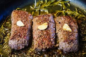 Rosemary lamb steaks with garlic photo