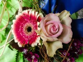 Bridal bouquet with different flowers photo