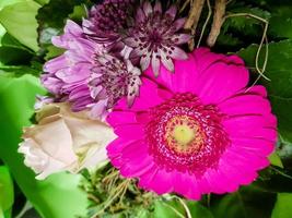 Bridal bouquet with different flowers photo