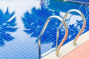 Stair swimming pool in beautiful luxury hotel pool resort photo