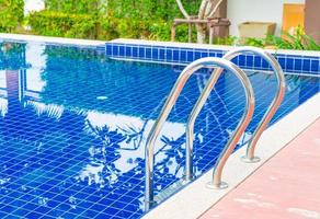 Stair swimming pool in beautiful luxury hotel pool resort photo