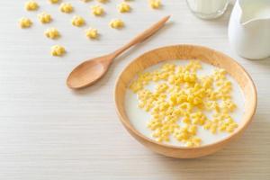 Whole grain cereals with fresh milk for breakfast photo