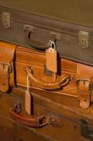 Stack of vintage leather suitcases photo