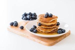 Stack of pancakes with fresh blueberry photo