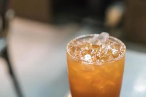 Iced lemon tea on the table photo