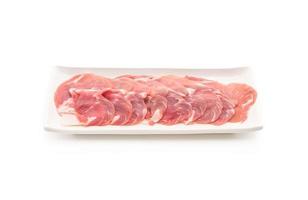 Fresh pork sliced on white background photo