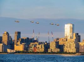 Six helicopter flying around the Manhattan city photo