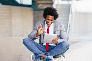 Black Businessman using a digital tablet
