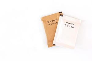 white and brown sugar bag on white background