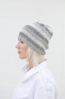 Beautiful young woman in warm grey beanie photo