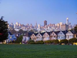 The Painted Ladies with the skyline of San Francisco, California, USA