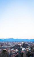 Turin panoramic skyline at sunset with Alps in background photo