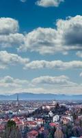 Turin panoramic skyline at sunset with Alps in background photo