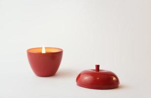 An apple-shaped red candle photo