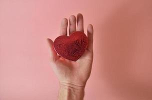 Red heart in hand photo