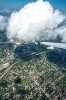 above the clouds and above minneapolis minnesota from airplane photo