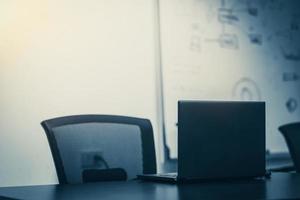 Close up microphone on table in meeting room at modern office photo