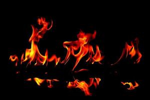 Cement tank at fire flames on blurred background photo