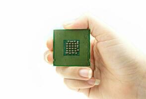 Realistic cpu back view processor chip in hand